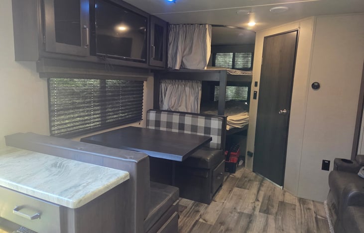 4 Person Dinette Table that turns into a bed. Twin Bunk Beds.