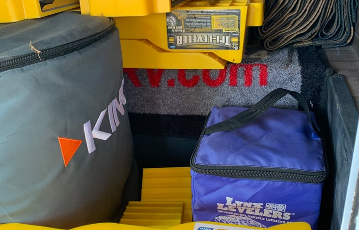 Levelers, chairs, and outdoor mat.  If interested for extra, we have a portable satellite.