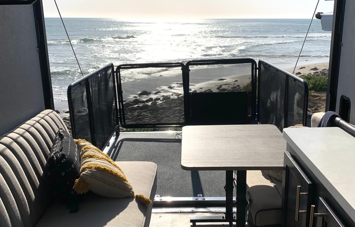 Back patio offers SPECTACULAR View from the rear party patio deck. Pull the comfy sofa and accent chair directly onto the deck for a fabulous star-gazing experience! Message me for better photos.