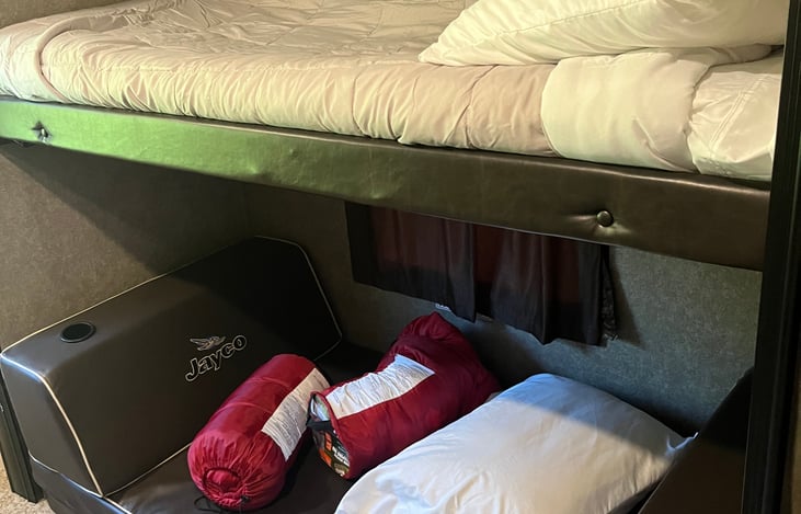 Twin bed with 2 twin sleeping mats.