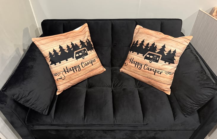 Comfy futon couch converts to a full bed and will sleep 1 adult or 2 children comfortably.