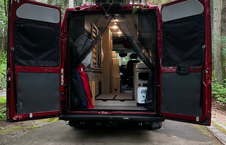 View from the rear.  The garage holds a lot of “stuff”.