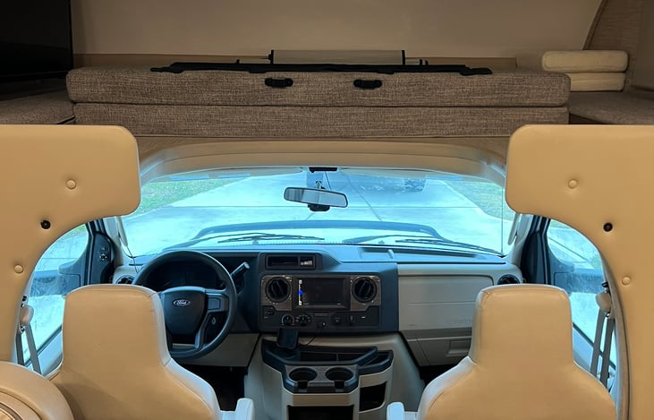 Overhead bunk with TV for the living area