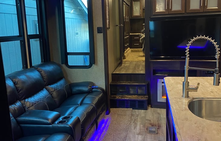 Main living area. Stairs/Hallway lead to master bedroom and master bathroom.