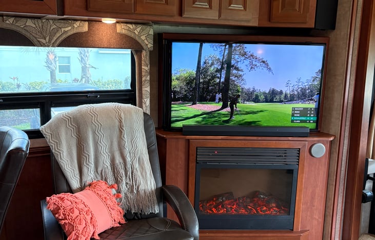 TV and electric heated fireplace. Great sound with a soundbar and subwoofer. All TVs have FireSticks so you can connect to the internet using your phone's hotspot.