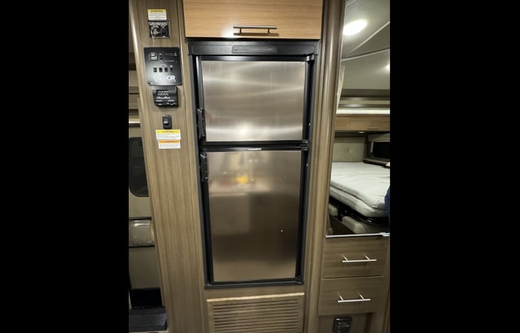 Refrigerator. Operates on 120V AC electric & propane.