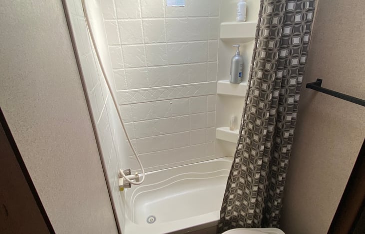 Shower/tub combo. Great if you have small children.