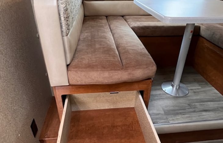 Long drawers on each side of dinette for storage