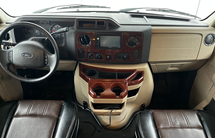 LED screen for utilizing backup camera and side turning cameras. AC makes for comfortable summer traveling.