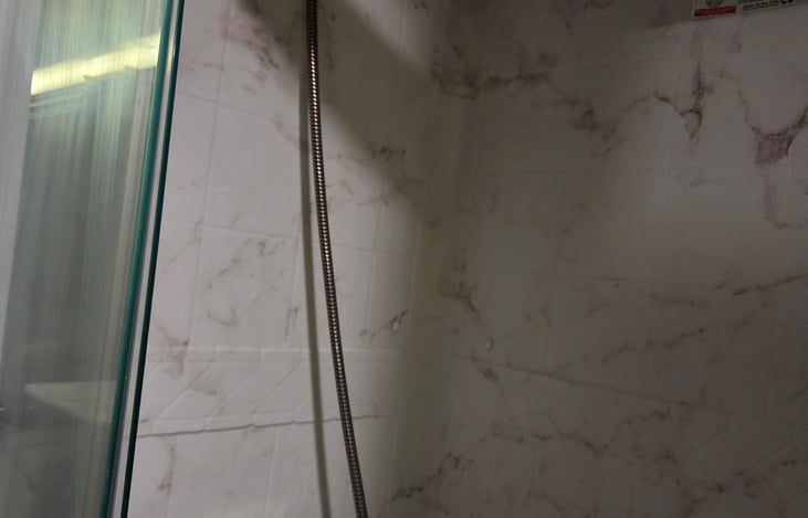 Shower unit indoors. There is also an exterior shower.