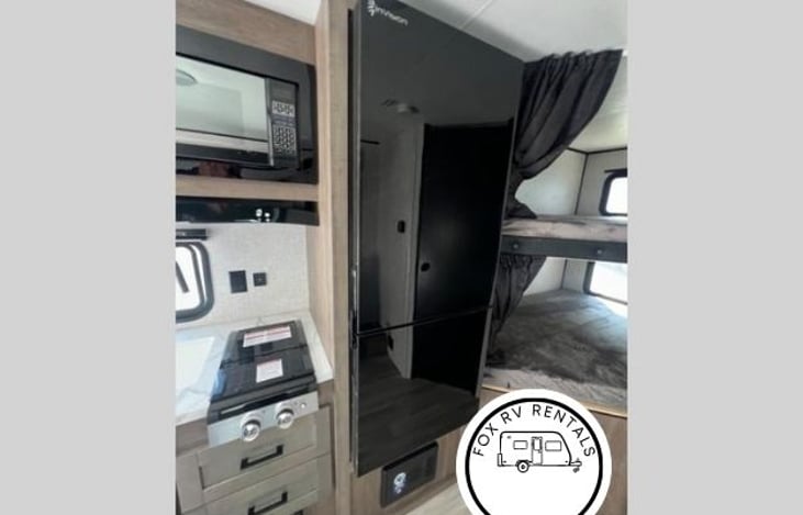 Huge fridge! Separate freezer too. Two full size bunks.