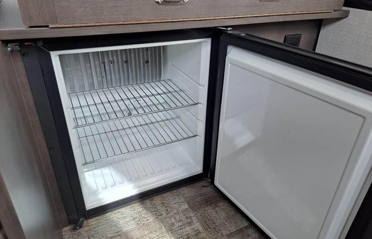 Small refrigerator perfect for snacks and drinks