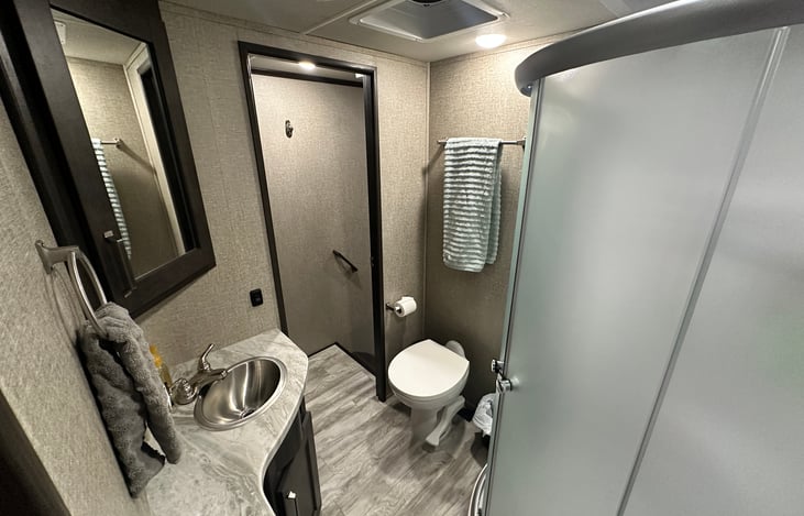 Bathroom filled with necessities for cleaning up after a fun day!