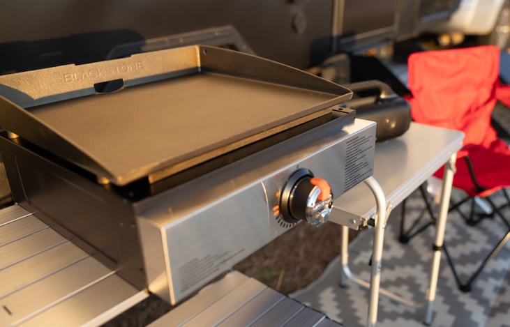 You'll love the outdoor kitchen equipped with with a Blackstone griddle!