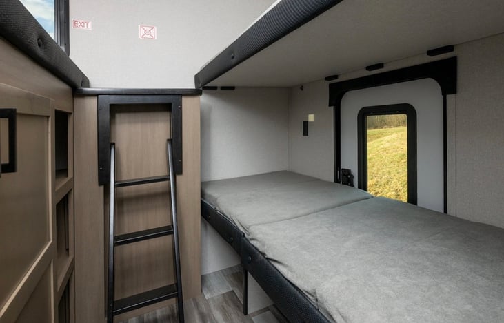 JayBird, Bunkhouse view.  With door to outside, bottom bunk folds for conversion to storage space or extra hauling options.