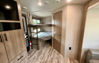 IMAGINE-2 Pvt Queen Master, Bunks, Dinette & Sofa