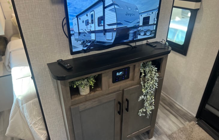 Entertainment Center with smart tv and bluetooth stereo