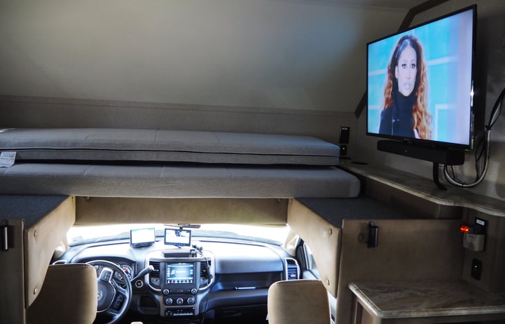 Double bed over cab and 42 in TV.