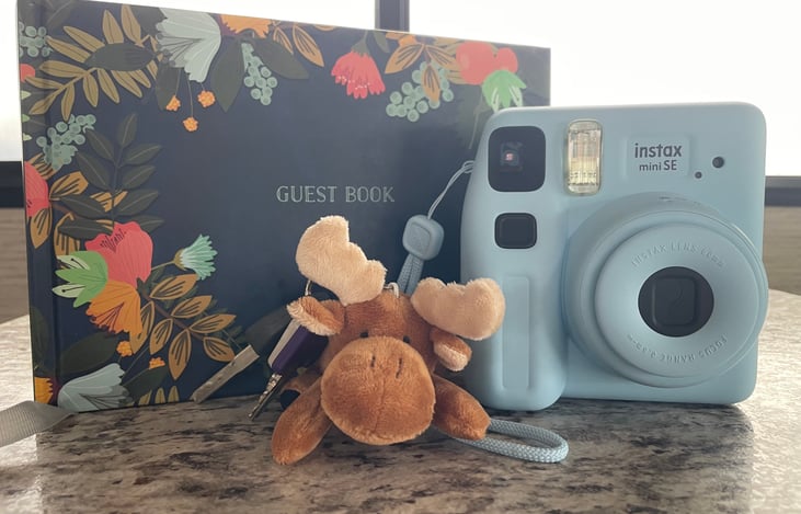 Guest book and polaroid camera to capture your adventures!