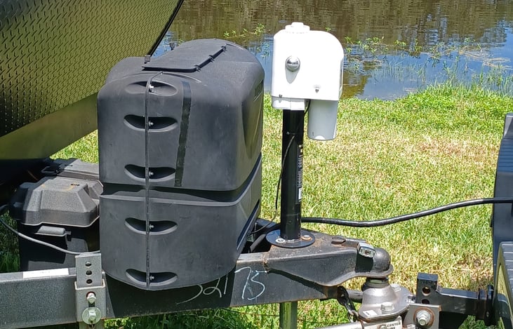 Battery and propane tanks.