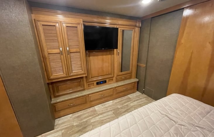 Rear bedroom tv and storage