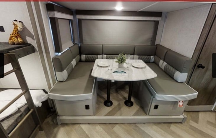 Spacious dinette that transforms into a full size bed that sleeps 2