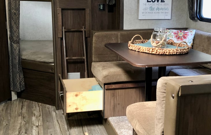 Extra storage under dining room seats