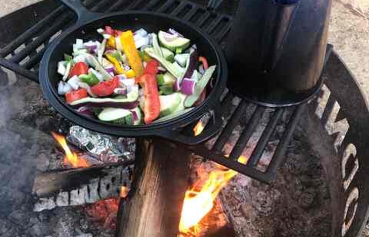 Cast iron pans available for cooking over the fire