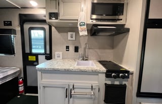 2 STEPS UP FROM A TENT