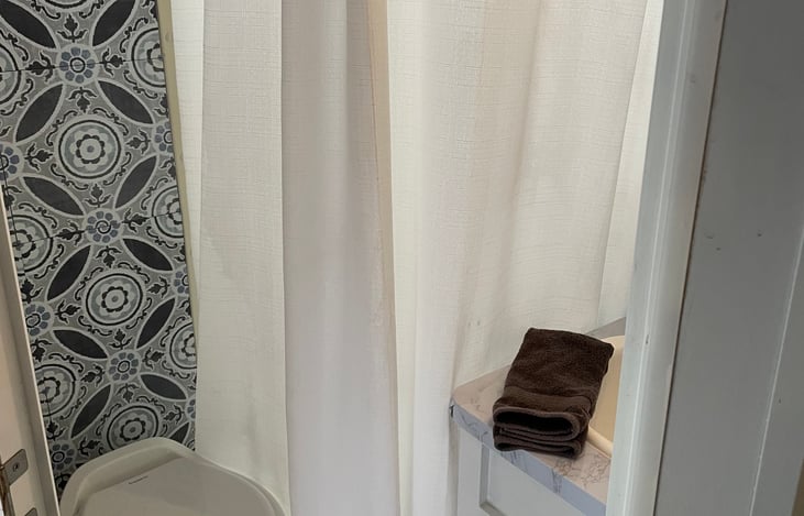 Updated bathroom, with upgraded faucet and shower head.