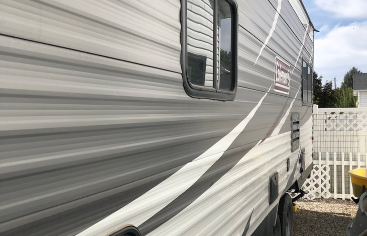 Side with outdoor shower and under carriage storage