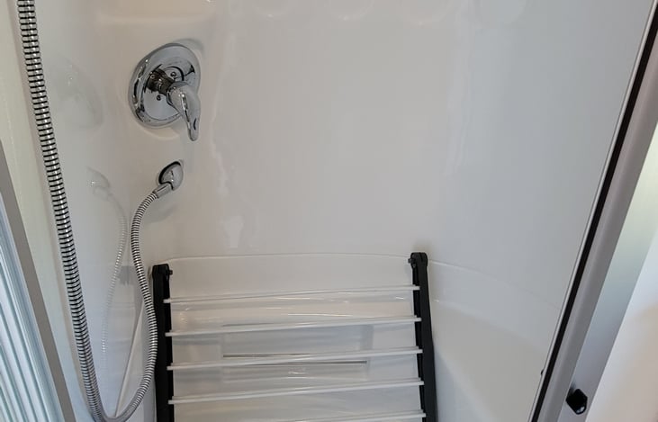 Shower and portable drying rack