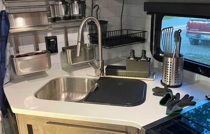 Fully equipped and neatly organized kitchen, and with a view!