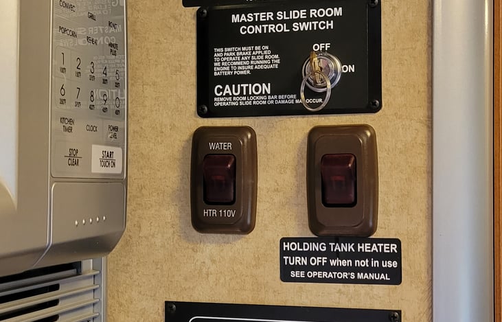 Master slide control switch. If Fall weather camping notice holding tank heater.