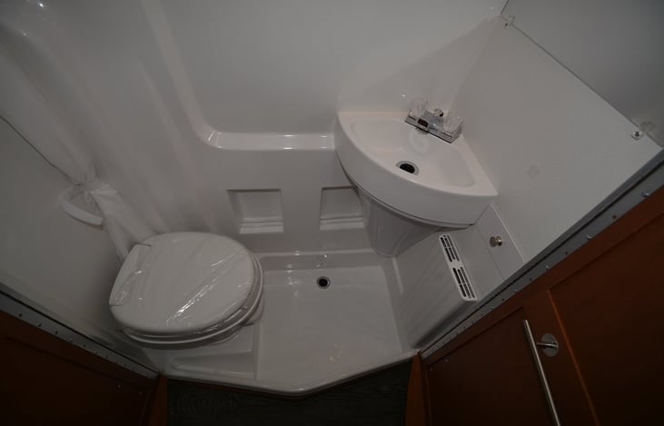 Shower, sink and toilet.