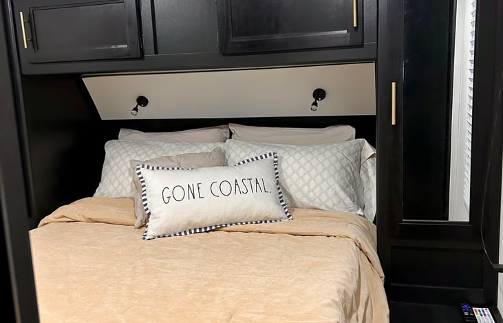 Private bedroom with door and full size memory foam 10inch mattress! Equipped with a tv and sound bar inside as well.