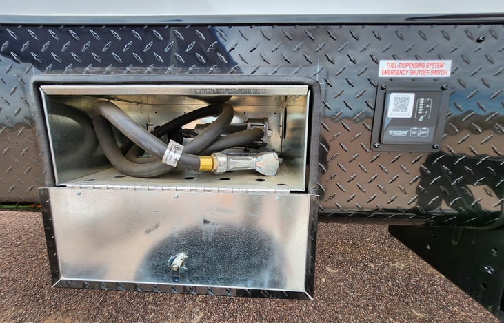 The toy hauler is equipment with its very own gas station and pump.