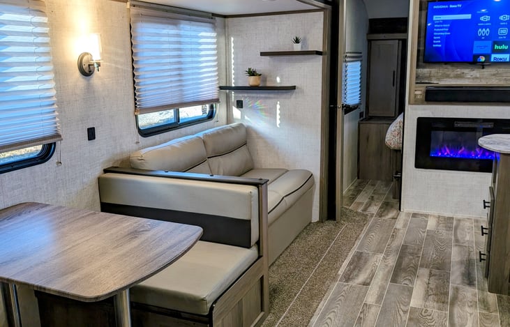 Jack knife couch and dinette offer lots of additional storage