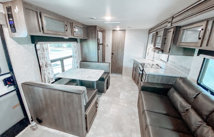 This unit has a side out creating a very spacious feel in the main living area