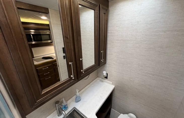 Bathroom sink and cabinets.