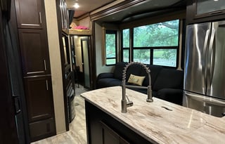 42’ Luxury Toyhauler with rare Side Patio