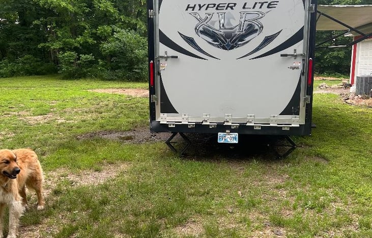 Rear ramp for loading motorcycle, and small atvs in 8’ x 10’ garage. Door is spring assisted and lockable.