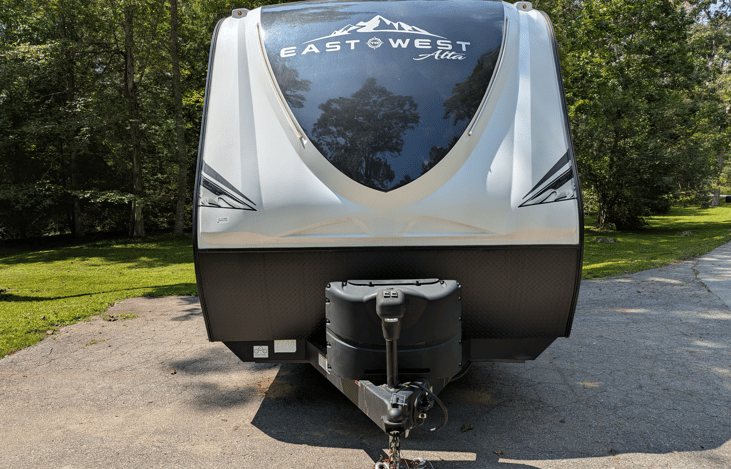 The East to West Alta is a spacious and luxurious camper. It features a bright and spacious interior, large kitchen island, 2 slide outs, king bed, outdoor kitchen, solar power and more.
