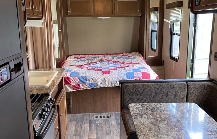 Queen size bed with plenty storage underneath and around.  Fridge and freezer are cold and deep. All appliances are functional.