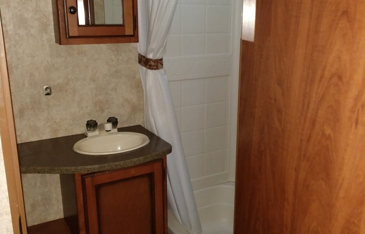 Toilet, Shower, Bathtub, Sink & cabinet storage space