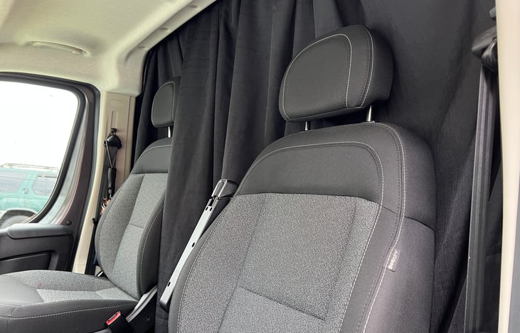The entire van comes with factory tinted windows, the truck itself is dark gray, when these black out curtains help to provide total privacy.