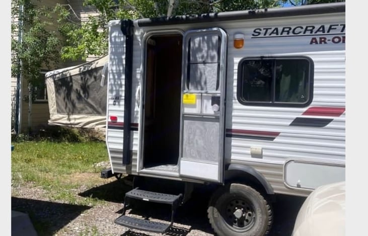 Here is the unique rear pop out that saves floor space and provides an additional sleeping area. It is tented with canvas but you can unzip it to allow a natural breeze and cross airflow through!