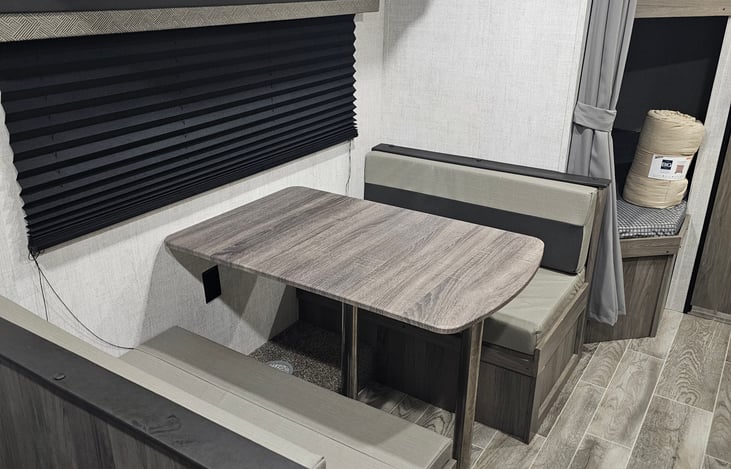 Sitting area that coverts to another bed