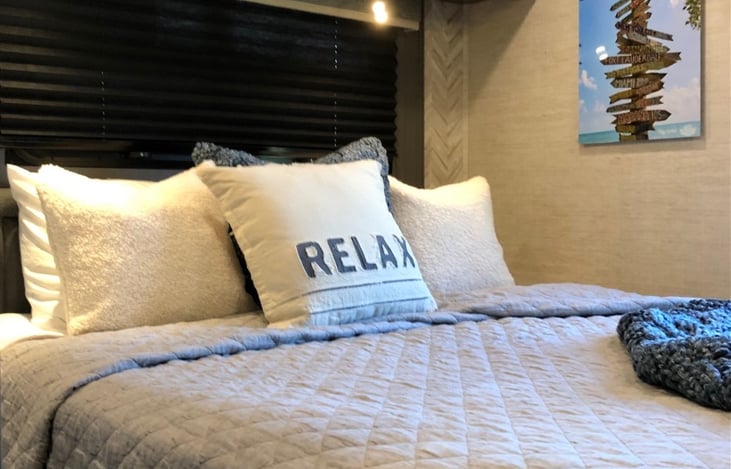 Main bed has upgraded, high thread-count sheets for a super comfortable rest. Bedroom also has two windows to enjoy the views.