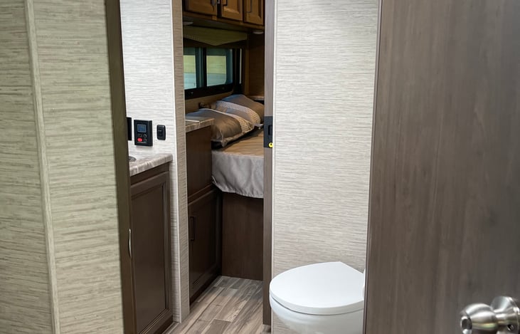 Walk through bath with sink and shower